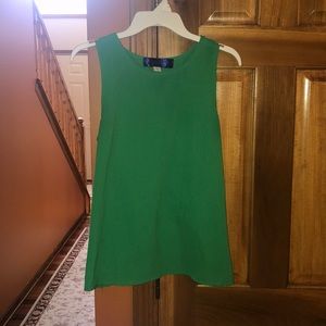 Francesca’s bright green tank top